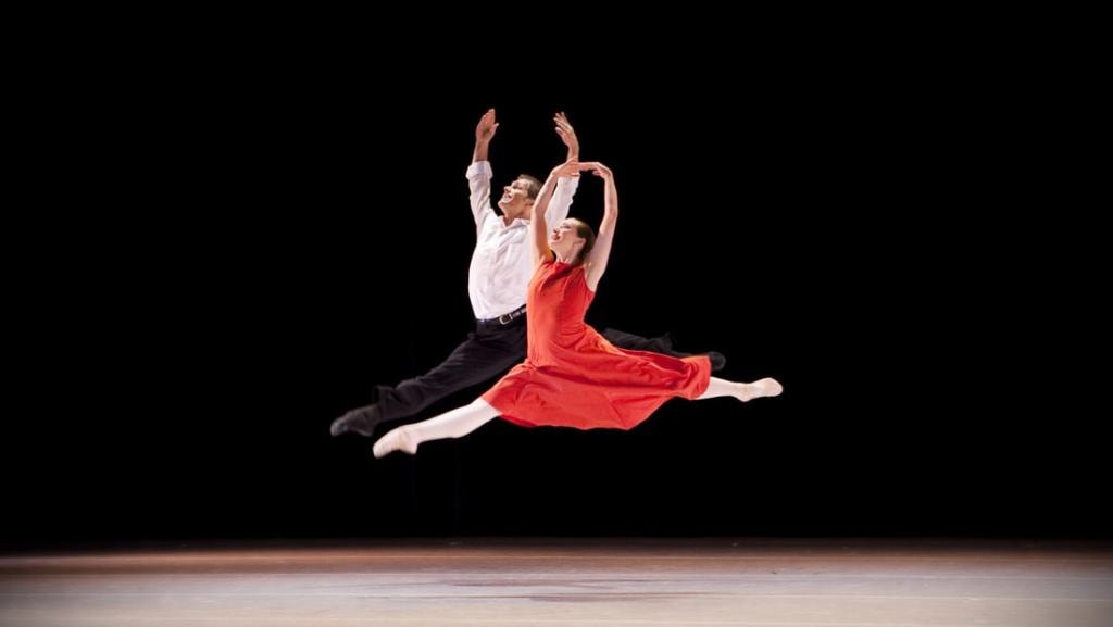 Ballet dancers performing a leap