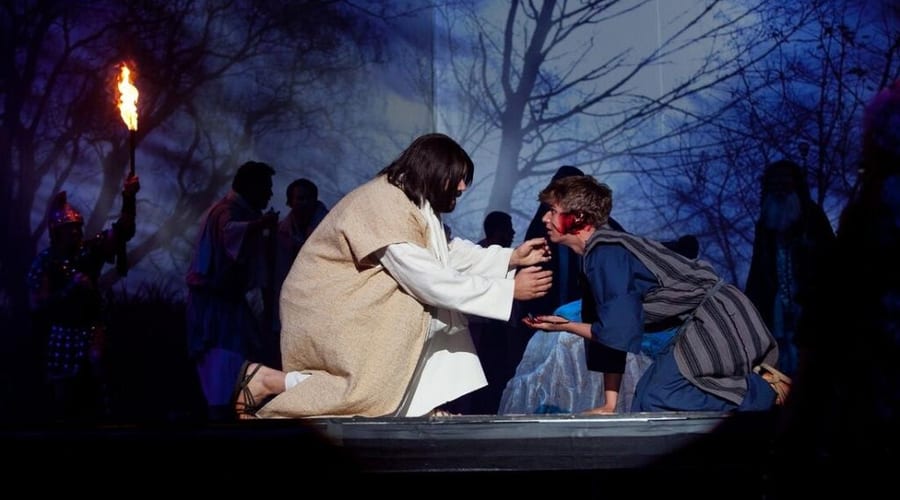 Theatrical drama scene with torchlight